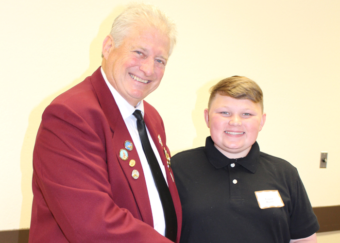 Left to right are Gary Grayson, Exalted ruler - Elks Lodge #6, Logan Rowley Sutter Middle School